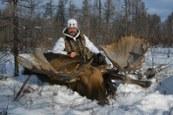 Hunter with Russiam Moose Troiphy