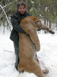 Happy Client with trophy Mountain Lion