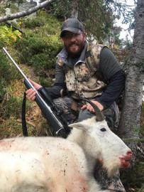 Hunter with his trophy Canadian mountain goat