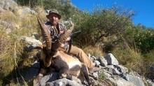A proud hunter with a Ronda Ibex
