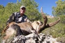Proud hunter with his Gredos Ibex Tropy in Spain