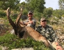 Two Hunters with a big Ibex