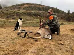 Hunter with a nice trophy Fallow Deer buck