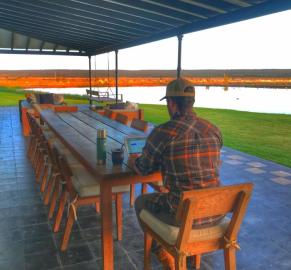 Exterior dining table at the red stag hunting lodge
