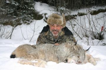 Hunter with his trophy lynx