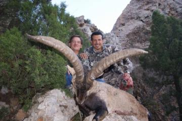 Happy Client and guide with a beceite ibex