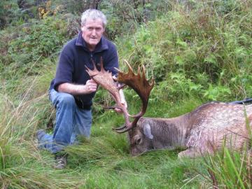 Hunter with Fallow Deer Trophy