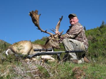 Hunter with a trophy Fallow Deer