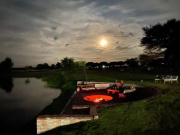 Red Stag hunting lodge fireplace at sunset